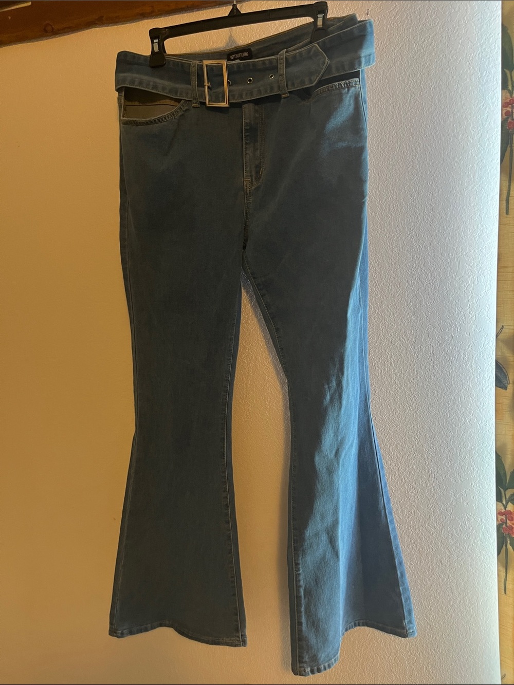 PrettyLittleThing Blue High-Rise Flare Jeans with attached Belt & cutout detail